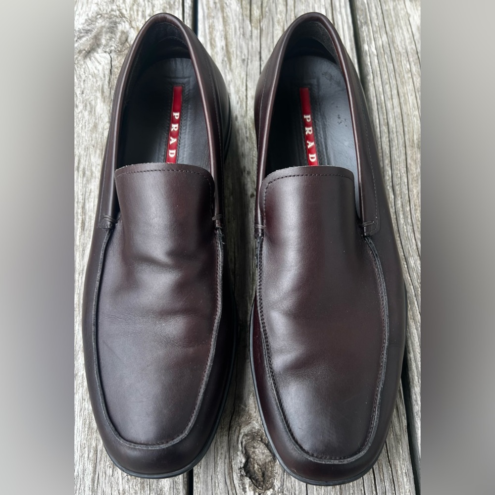 PRADA Men’s loafer in burgundy - size 8.5 US/ 7.5 EU, measures 11 inches.